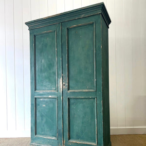 An English 19th Century Cupboard in Green Paint