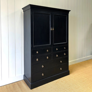 A Large 19th Century English Ebonized Linen Press Cupboard