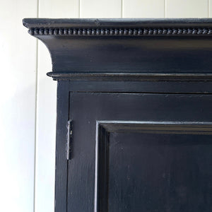 A Large 19th Century English Ebonized Linen Press Cupboard