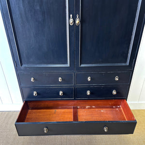 A Large 19th Century English Ebonized Linen Press Cupboard