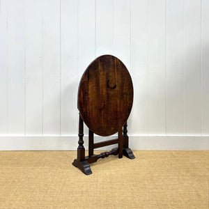 An Antique English Country Oak Coaching Gate Leg Table