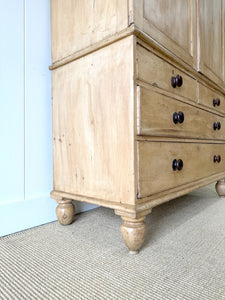 A 19th Century English Pine Linen Press Cupboard