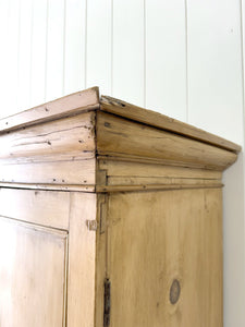 A 19th Century English Pine Linen Press Cupboard