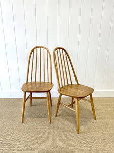 A Pair of Oak Ercol Chairs