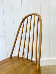 A Pair of Oak Ercol Chairs