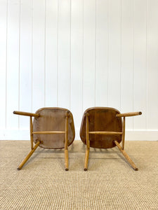 A Pair of Oak Ercol Chairs