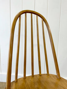 A Pair of Oak Ercol Chairs