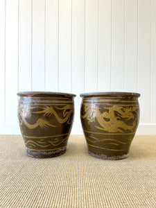 A Pair of Antique Chinese Garden Pots with Dragon Motif