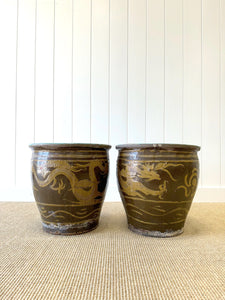 A Pair of Antique Chinese Garden Pots with Dragon Motif