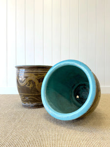 A Pair of Antique Chinese Garden Pots with Dragon Motif