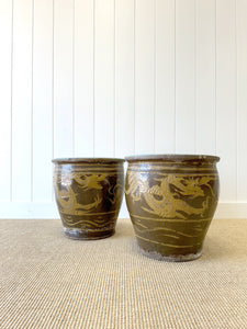 A Pair of Antique Chinese Garden Pots with Dragon Motif