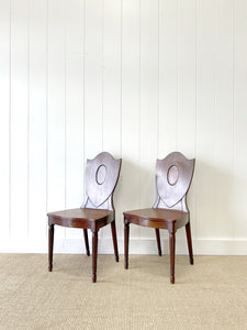 A Pair of Regency Fluted Leg Hall Chairs