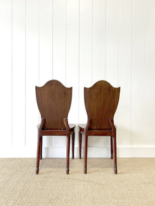 A Pair of Regency Fluted Leg Hall Chairs