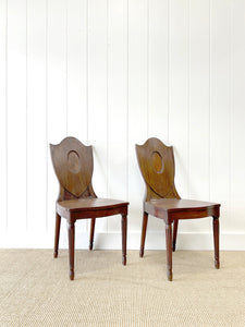 A Pair of Regency Fluted Leg Hall Chairs