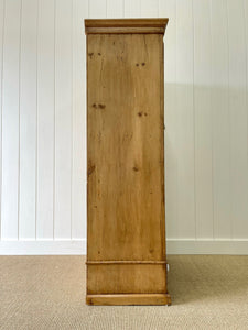 A Handsome English 19th Pine Cupboard with Porcelain Knobs