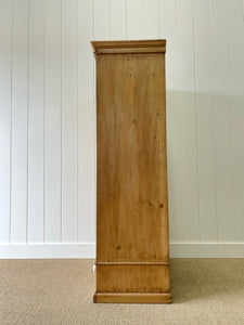 A Handsome English 19th Pine Cupboard with Porcelain Knobs