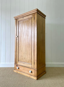 A Handsome English 19th Pine Cupboard with Porcelain Knobs