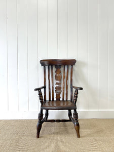 A 19th Century High Back Armchair