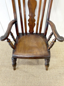 A 19th Century High Back Armchair