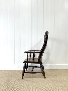 A 19th Century High Back Armchair