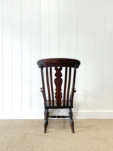 A 19th Century High Back Armchair