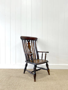 A 19th Century High Back Armchair