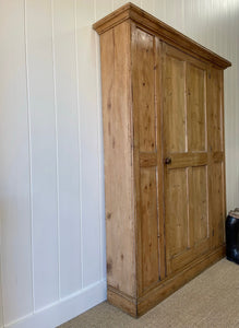 A 19th Century English Pine Livery or Coat Cupboard