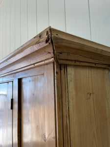 A 19th Century English Pine Livery or Coat Cupboard