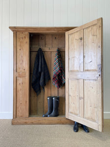 A 19th Century English Pine Livery or Coat Cupboard