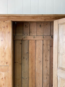 A 19th Century English Pine Livery or Coat Cupboard