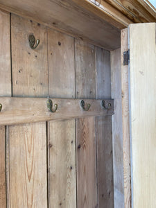 A 19th Century English Pine Livery or Coat Cupboard