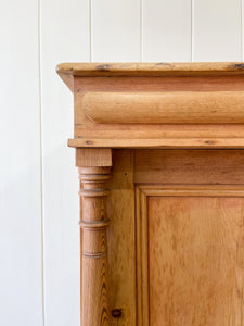 A Handsome English 19th Century Pine Cupboard with Wooden Knobs