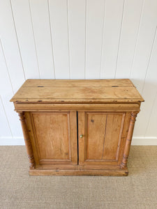 A Handsome English 19th Century Pine Cupboard with Wooden Knobs