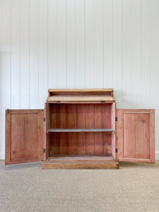 A Handsome English 19th Century Pine Cupboard with Wooden Knobs