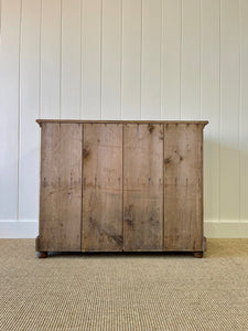 A Handsome English 19th Century Pine Cupboard with Wooden Knobs