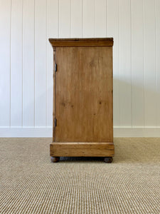 A Handsome English 19th Century Pine Cupboard with Wooden Knobs