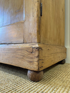 A Handsome English 19th Century Pine Cupboard with Wooden Knobs