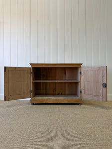 A Handsome English 19th Century Pine Cupboard with Wooden Knobs