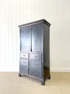 A Handsome Irish Georgian Ebonized Pine Housekeeper's Cupboard