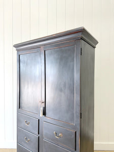 A Handsome Irish Georgian Ebonized Pine Housekeeper's Cupboard