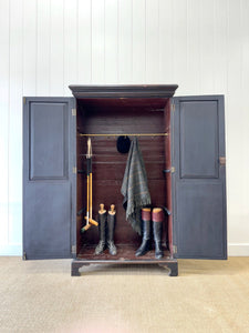 A Handsome Irish Georgian Ebonized Pine Housekeeper's Cupboard