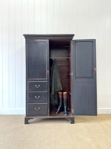 A Handsome Irish Georgian Ebonized Pine Housekeeper's Cupboard