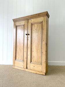 An English 19th Century Shallow Pine Cupboard