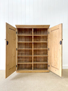 An English 19th Century Shallow Pine Cupboard