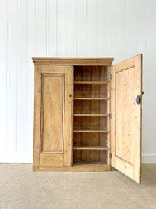 An English 19th Century Shallow Pine Cupboard