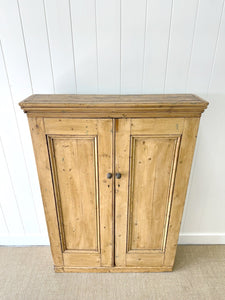 An English 19th Century Shallow Pine Cupboard