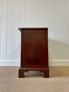 A Petite English Mahogany Bachelors Chest of Drawers Dresser with Brushing Slide  c1800