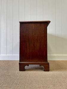 A Petite English Mahogany Bachelors Chest of Drawers Dresser with Brushing Slide  c1800