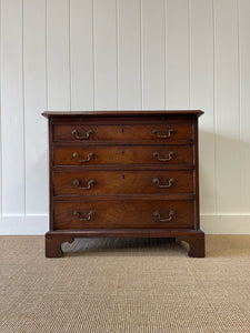 A Petite English Mahogany Bachelors Chest of Drawers Dresser with Brushing Slide  c1800