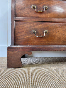 A Petite English Mahogany Bachelors Chest of Drawers Dresser with Brushing Slide  c1800